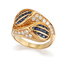 AN 18CT DIAMOND AND SAPPHIRE RING, the stylised snake head crossover ring w