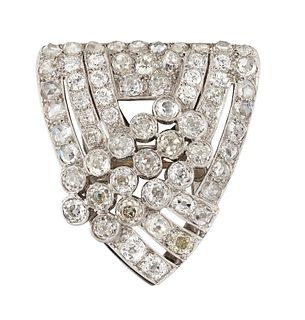 AN ART DECO DIAMOND DRESS CLIP, the triangular clip set with lines of old m
