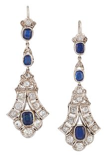 A PAIR OF EARLY 20TH CENTURY SAPPHIRE AND DIAMOND EARRINGS, the central cus