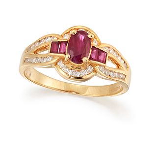 AN 18CT RUBY AND DIAMOND RING, the central oval ruby set to either side wit