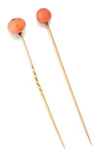 A FRENCH CORAL AND DIAMOND STICK PIN AND ANOTHER,?a round coral bead stick 