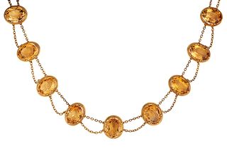 A CONTINENTAL?CITRINE NECKLACE, the nine oval faceted citrines, all claw mo