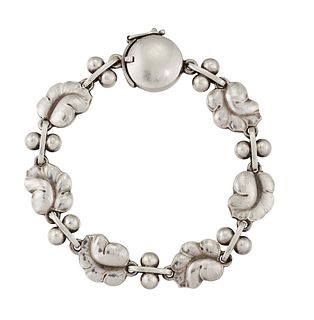 A GEORG JENSEN BRACLET, no.96, MOONLIGHT GRAPES, the repousse leaves inters