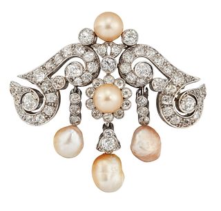 A NATURAL SALTWATER PEARL AND DIAMOND BROOCH, the central pearl surrounded 