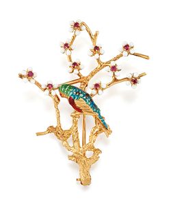 AN 18CT ENAMEL AND RUBY PARROT BROOCH, the polychrome parrot sat on texture