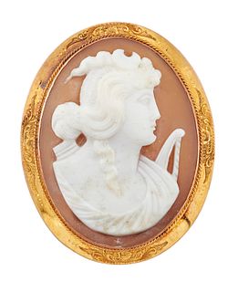 A 9CT SHELL CAMEO BROOCH, the oval shell cameo set with a depiction of the 