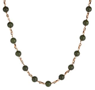 A NEPHRITE BEAD NECKLACE, the uniform round nephrite beads, each approx. 8.