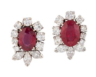 A PAIR OF 18CT WHITE GOLD RUBY AND DIAMOND EARRINGS, the oval rubies in a f