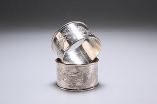 TWO CHINESE SILVER NAPKIN RINGS, of circular form, the central band engrave