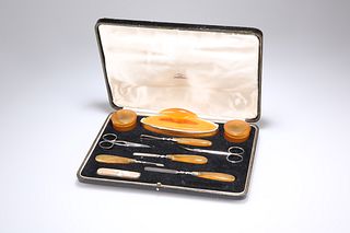 A VINTAGE MANICURE SET, in a Mappin & Webb fitted box, the boxes and handle