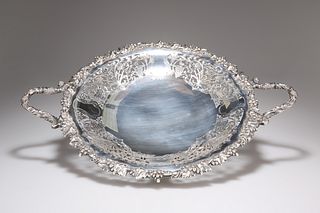 A GEORGE V SILVER TWIN HANDLED CAKE STAND, by Walker and Hall, Sheffield 19