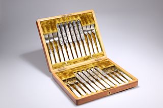 A SET OF VICTORIAN SILVER AND MOTHER-OF-PEARL HANDLED FRUIT KNIVES AND FORK