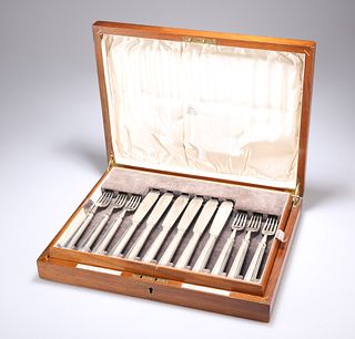 A SET OF TWELVE GEORGE V SILVER FISH KNIVES AND FORKS,?by?Goldsmiths & Silv