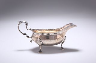 A GEORGE III PROVINCIAL SILVER SAUCE BOAT,?by?John Langlands?I & John Rober