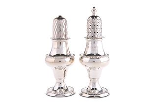 A PAIR OF ELIZABETH II SILVER SALT AND PEPPER CASTERS,?by?Laurence R Watson