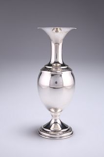 A CONTINENTAL SILVER VASE, possibly Italian, of pedestal form with high tru