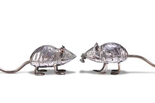 TWO WHITE-METAL MODELS OF MICE, each modelled standing and with long undula