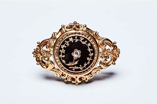 GOLD AND ONYX BROOCH