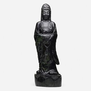 Chinese, Large spinach green jade figure of Guanyin