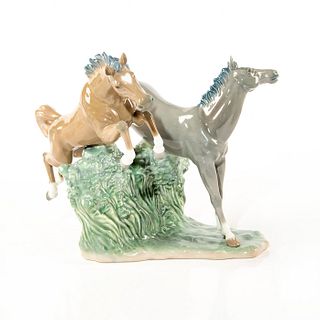 Porcelain Sculpture Jumping Horses Over A Hedgerow Nao