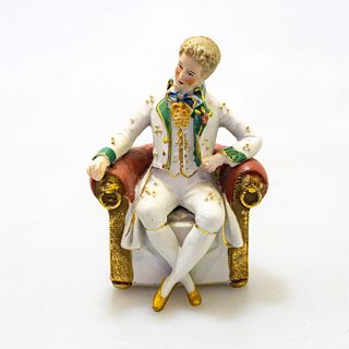 German Porcelain Figurine, Man In Chair 4214