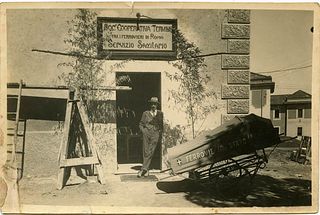 <br><br>Railway Health Service in Rome Termini, 1920 circa<br>17 x 11 cm<br><br>A man portrayed at the door of the health service, next to a cart for 