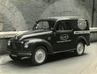 <br><br>Fiat 500 C Furgoncino, 1950 circa<br>24 x 17 cm<br>Fiat 500 C "Van", bodywork with ROMCA dealer commercial advertising. Print on single-coated