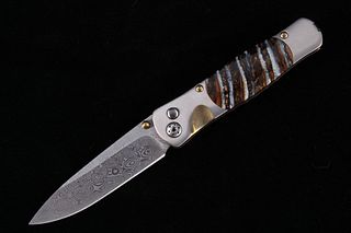 Tesoro Damascus Titanium Mammoth Tooth Knife