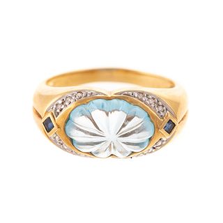 An 18K Carved Blue Topaz, Sapphire & Diamond Ring