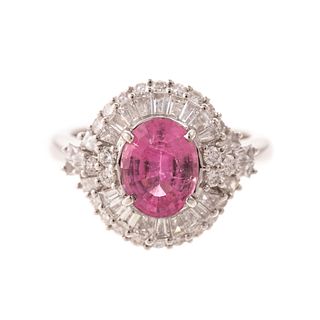 An 18K Pink Sapphire & Elaborate Diamond Halo Ring