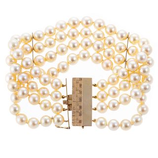 A Four Strand Golden Pearl Bracelet with 14K Clasp