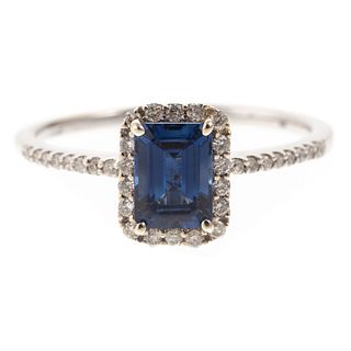 A Sapphire & Diamond Halo Ring in 14K