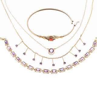 A Collection of Amethyst Jewelry in Gold