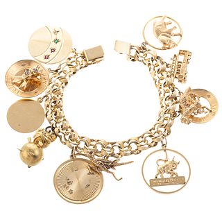 A Whimsical Charm Bracelet in Solid 14K Gold