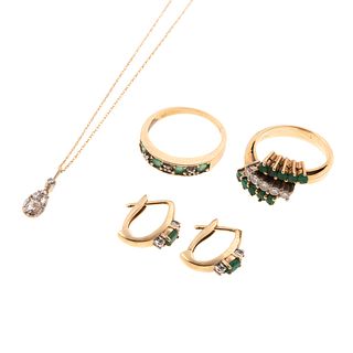A Collection of Emerald & Diamond Jewelry in Gold