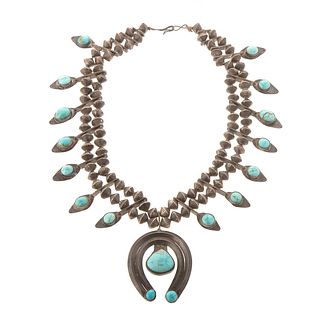 A Sterling Navajo Turquoise Squash Blossom