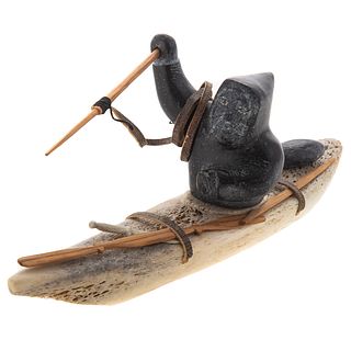 Inuit Carved Figural Group: Hunter in Kayak