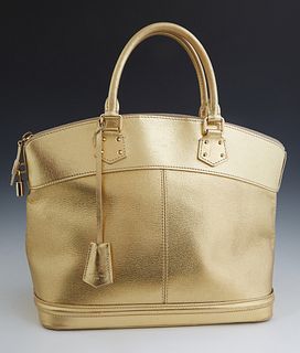 Louis Vuitton Gold Suhali Leather Lockit MM Bag, with gold tone hardware, the zipper opening to a gold jacquard lining with three in...