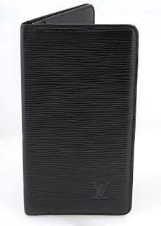 Louis Vuitton Black Bifold Epi Wallet, with embossed "LV" on the front corner, the interior with four bill holders and six card hold...