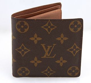 Louis Vuitton Marco Wallet, in brown and tan coated canvas monogram, with dual bill compartments, four card slots and a single inter...