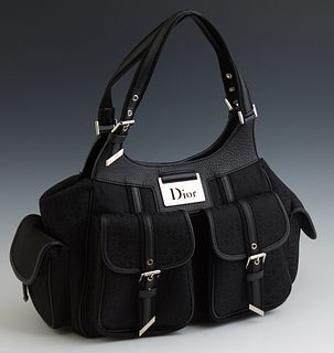 Christian Dior Medium Detective Black Monogram Canvas Bag, with silver hardware, the magnetic snap button closure opening to a lined...