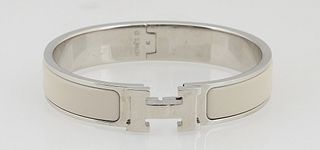 Hermes White Silver Clic Clac Bracelet, with two tone palladium-plated turn-lock closure, Dia.- 2 in.