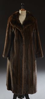 Vintage Full Length Dark Brown Mink Coat by Jay Lester, retailed by Gus Mayer New Orleans, with a rolled collar and jewel length sle...