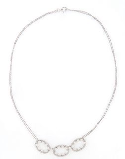 14k White Gold Necklace, with three central diamond mounted oval links, suspended from two tiny link chains on each side, total diam...