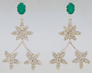 Pair of 14k White Gold Pendant Earrings, with an oval emerald mounted stud suspending three flowers with diamond mounted petals, tot...