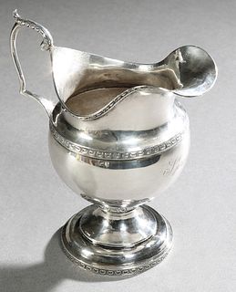 Bailey & Co. Coin Silver Creamer, 19th c., with relief shell decoration, the side engraved "Sproul," stamped Bailey on the underside...