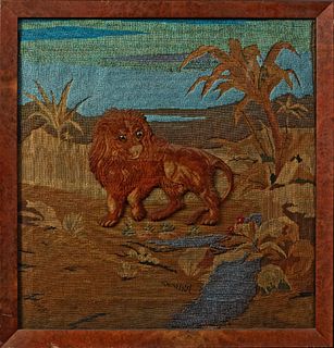 English School, "The Lion Rampant," 19th c., needlepoint, bead and Berlin work picture, with glass eyes, presented in a burled frame...