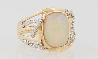 Lady's 14k White Gold Dinner Ring, with an oval cabochon 2.67 carat opal, over pierced diamond mounted wide shoulders of the band, t...