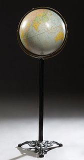 Brass Mounted Replogle Comprehensive World Globe, 20th c, on a cast iron support to a pierced tripodal iron base, Globe- H.- 51 in.,...