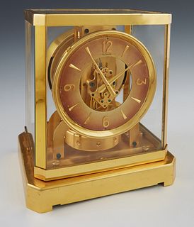 Jaeger LeCoultre Brass and Glass Atmos Clock, Ser. # 34294, c.1960, H.- 9 3/8 in., W.- 8 1/4 in., D.- 6 1/4 in. Provenance: from a collection of an an